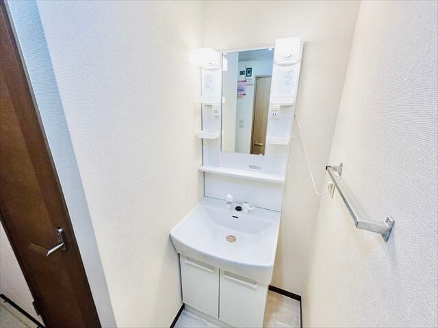 洗面設備　同一建物内１０６号室内装写真転載