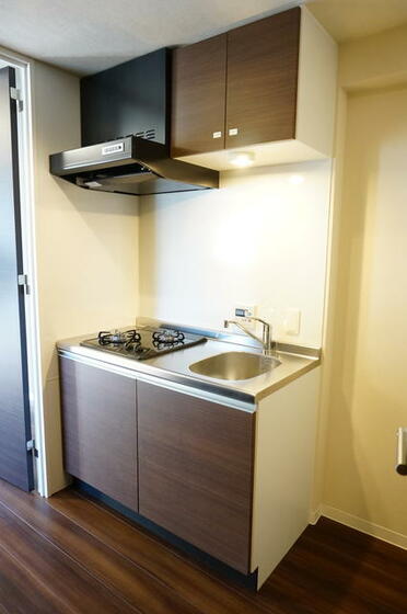 キッチン　２口ガスコンロ。４Ｆのお部屋の写真です。現況優先。