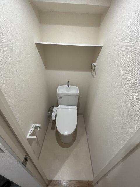 トイレ　温水洗浄便座?