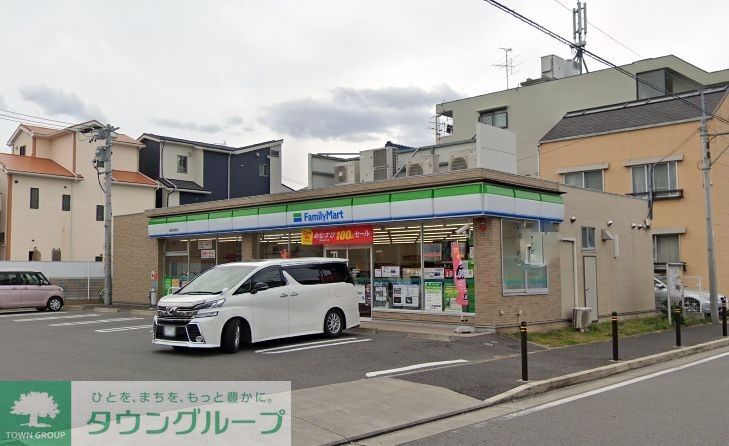 コンビニ　ファミリーマート名西枇杷島店（コンビニ）まで560m