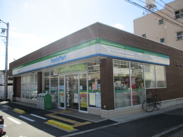 コンビニ　ファミリーマート 豊新四丁目店（コンビニ）まで448m