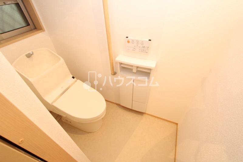 寝屋川市田井町22-11貸家のトイレ写真