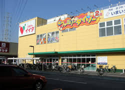 ショッピングセンター　コモディイイダ豊春店（ショッピングセンター）まで510m