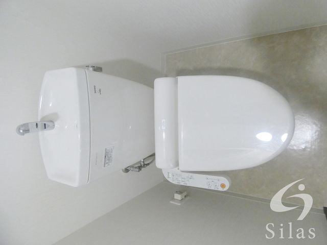 阪急千里線 天神橋筋六丁目駅 徒歩2分 10階建 築15年のトイレ写真
