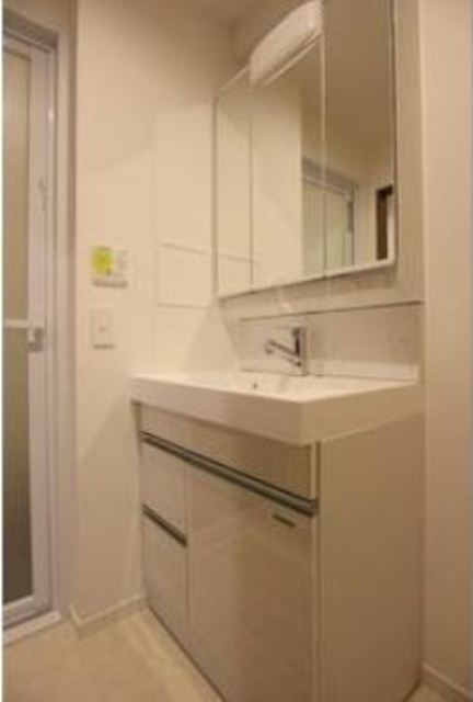 洗面設備　※入居中の為別部屋写真使用現状優先