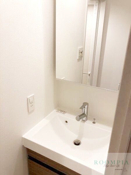 洗面設備　※同タイプの別のお部屋です。