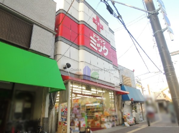 ドラックストア　ドラッグミック 柏原駅西口店（ドラッグストア）まで392m