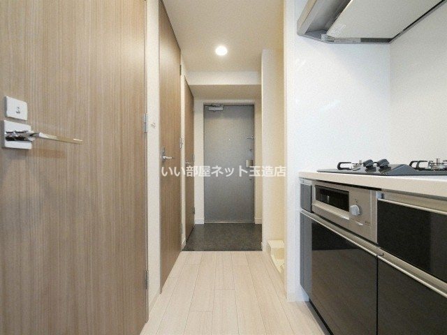 プレサンス谷町九丁目ディセオの玄関写真