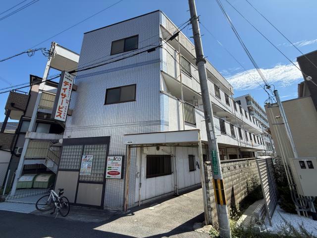 阪急京都線 富田駅 徒歩1分 3階建 築35年の外観写真