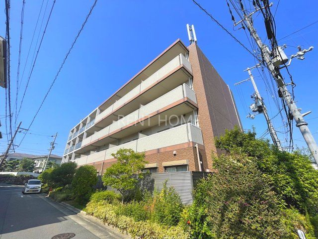 八尾市上之島町南のマンションの建物外観