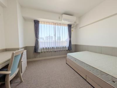 居室・リビング　写真は９１１号室（東Ａタイプ）のものです。