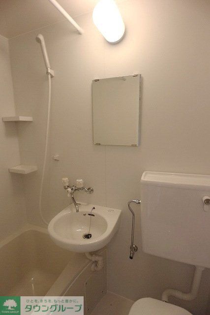 洗面設備　写真は同タイプ住戸です。