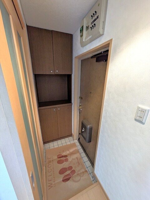 ステータスヒル甲府七番館の玄関写真