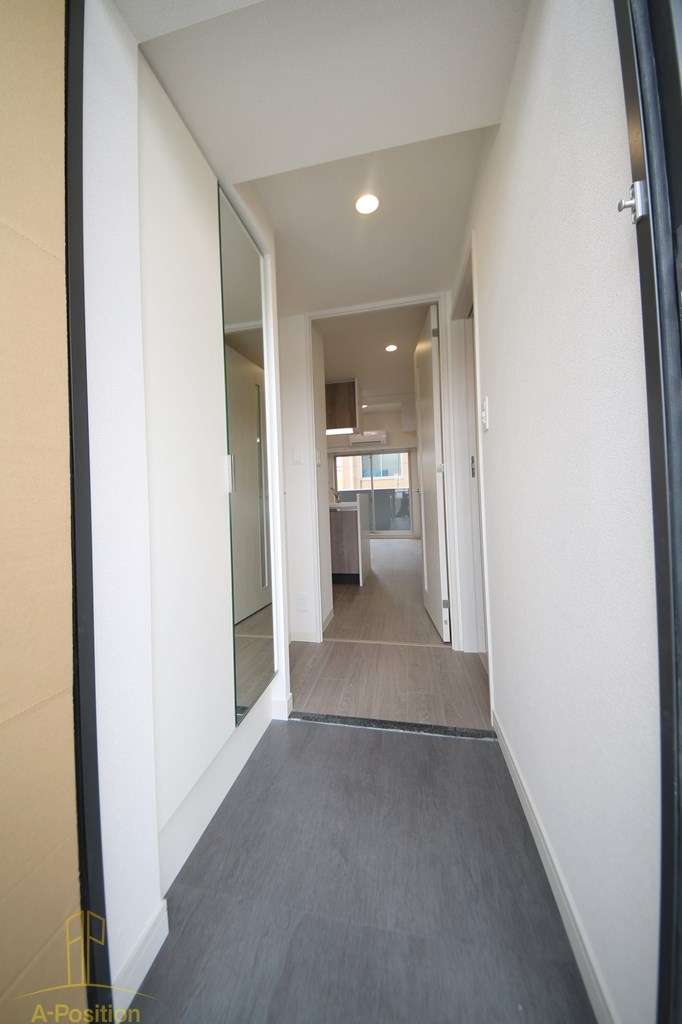 玄関　プレサンスDOMECITYコレーレ