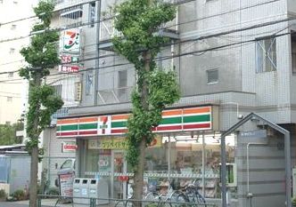 コンビニ　セブンイレブン 千住桜木店（コンビニ）まで718m