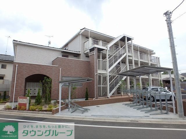 日野市大字豊田のアパートの建物外観