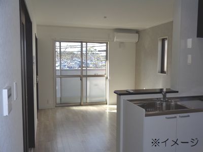 豊川市白雲町ガレージハウスの居間写真