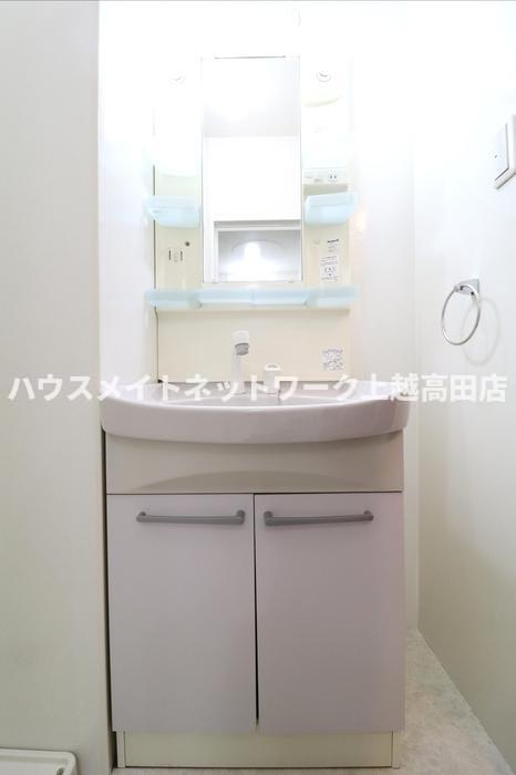 洗面設備　洗髪洗面化粧台（参考同型101号室室内写真）