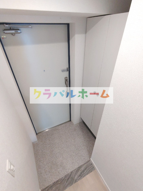 プルメリア西三国イーストの玄関写真