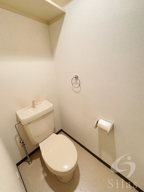 地下鉄御堂筋線 昭和町駅 徒歩4分 11階建 築25年のトイレ写真