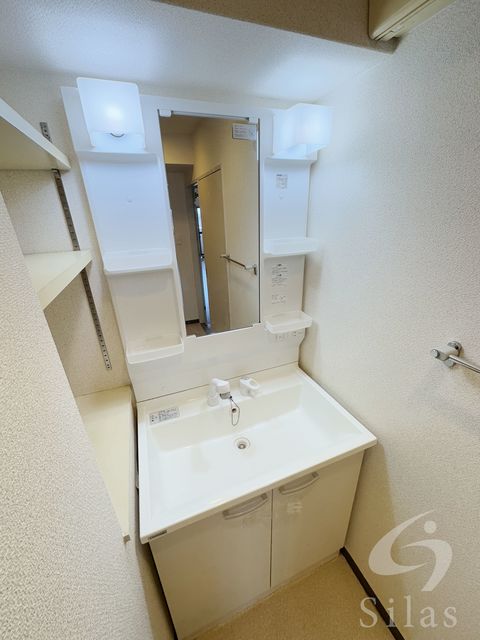 地下鉄御堂筋線 昭和町駅 徒歩4分 11階建 築25年の内装写真