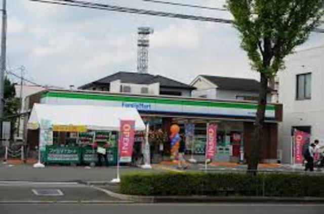 コンビニ　ファミリーマート茨木中穂積店（コンビニ）まで384m