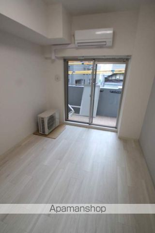 プレサンス堺筋本町センティスの居間写真