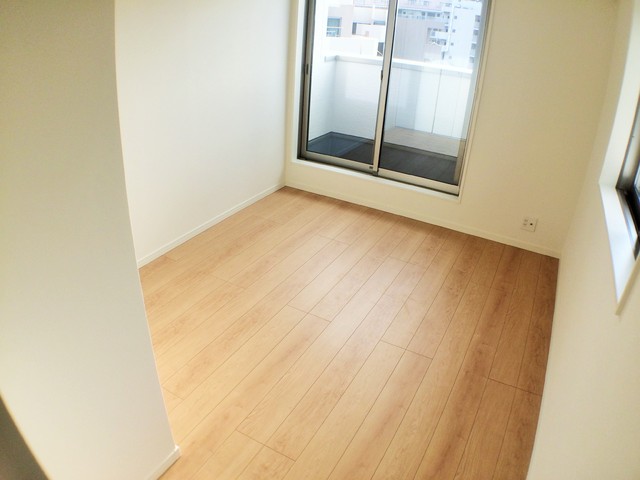 グランメール腕塚町8丁目の居間写真