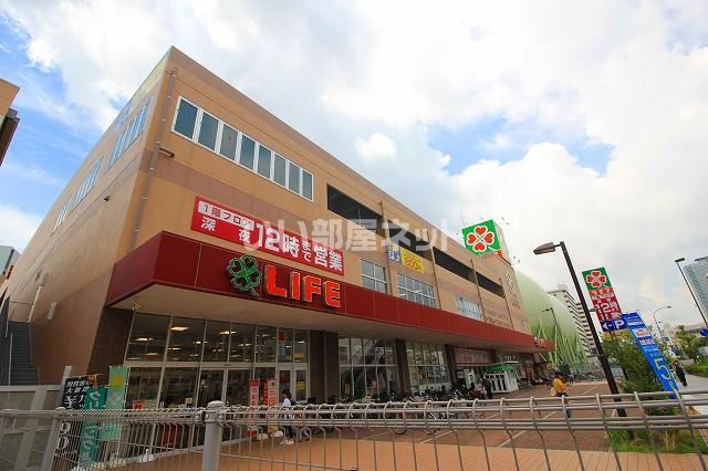 コンビニ　ライフ春日野道店（コンビニ）まで490m