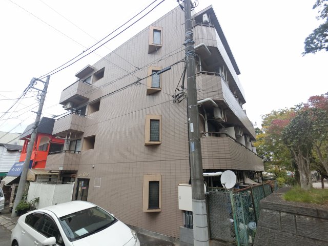 印旛郡酒々井町東酒々井のマンションの建物外観