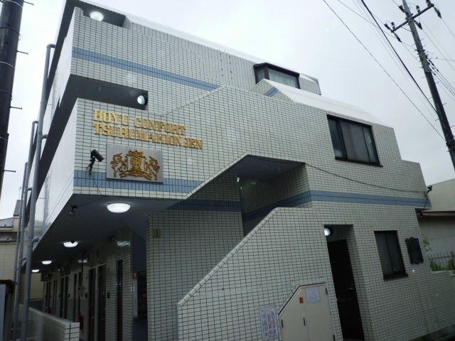 秦野市鶴巻南のマンションの建物外観