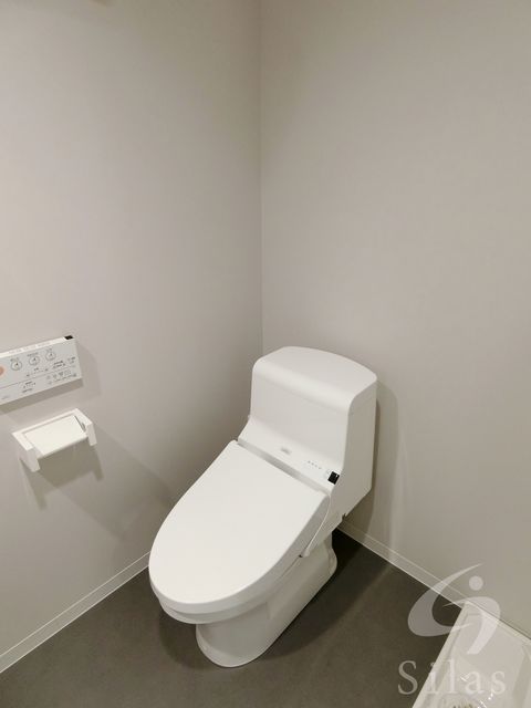 地下鉄四つ橋線 住之江公園駅 徒歩7分 2階建 築11年のトイレ写真