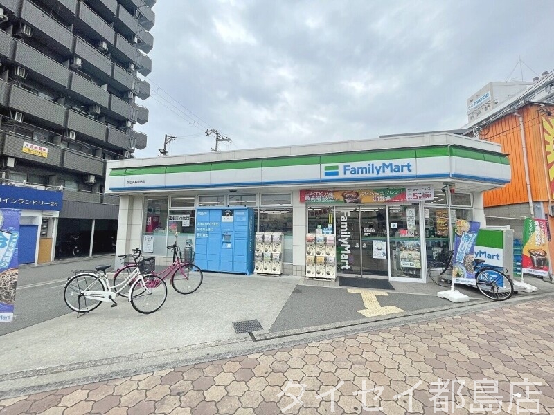 コンビニ　ファミリーマート関目高殿駅西店（コンビニ）まで372m