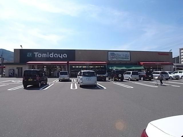 スーパー　トミダヤ三田洞店（スーパー）まで661m