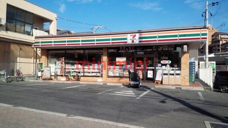 コンビニ　セブンイレブン吹田朝日が丘店（コンビニ）まで119m