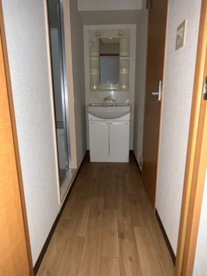 洗面設備　※別号室の写真を使用しております。