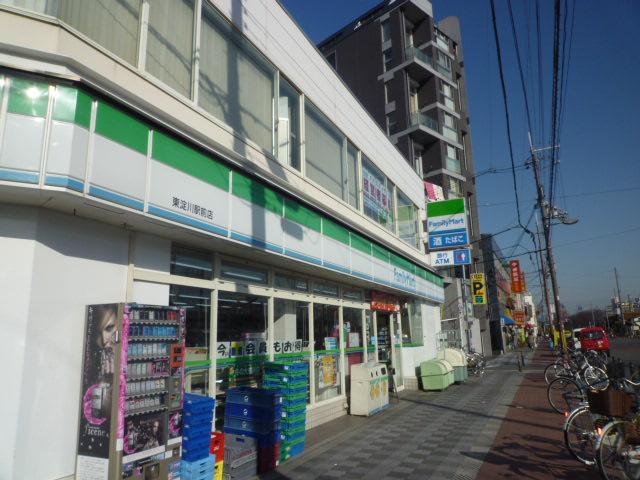 コンビニ　ファミリーマート東淀川駅前店（コンビニ）まで400m