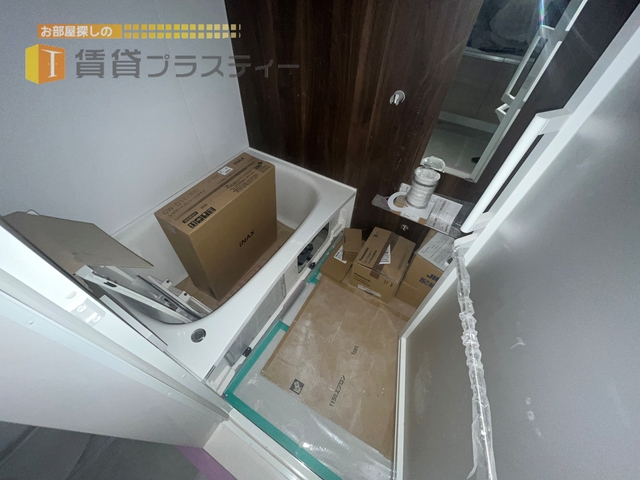 バス・シャワールーム　お洒落なアクセントパネルを採用。