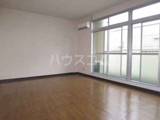 丸鈴グリーンビルBの居間写真