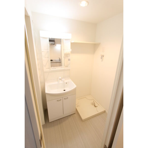 洗面設備　※同シリーズの室内写真となります。
