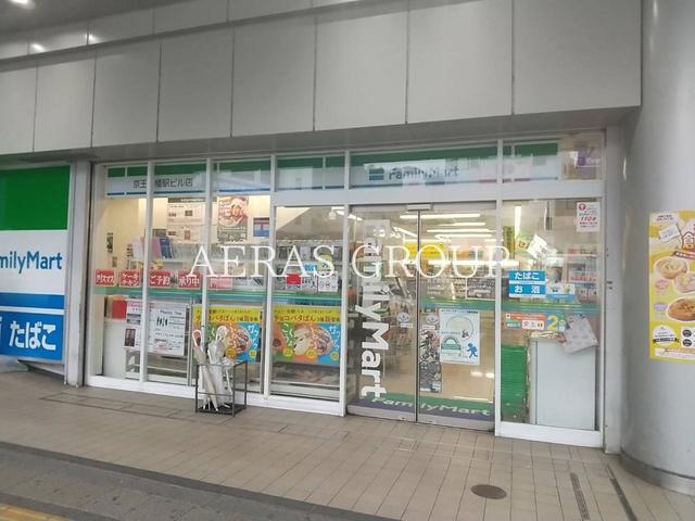 コンビニ　ファミリーマート 京王高幡駅ビル店（コンビニ）まで1m