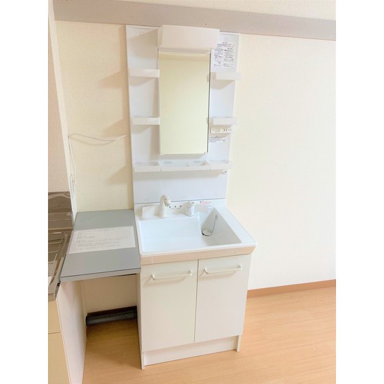 洗面設備　※１０１号室（モデルルームの写真です）