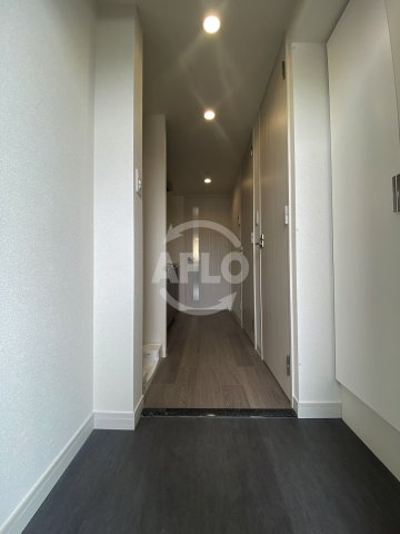 玄関　プレサンスDOMECITYコレーレ　玄関