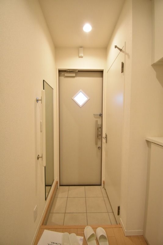 パームコテージIII番館の玄関写真