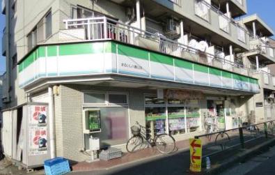 コンビニ　ファミリーマートまるいし八幡山店（コンビニ）まで389m