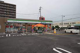 コンビニ　ファミリーマート 明石八木店（コンビニ）まで587m