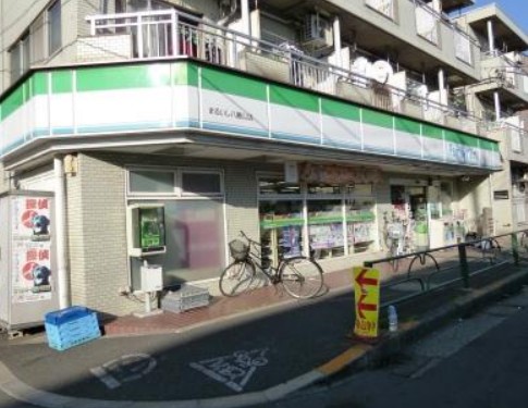 コンビニ　ファミリーマートまるいし八幡山店（コンビニ）まで614m