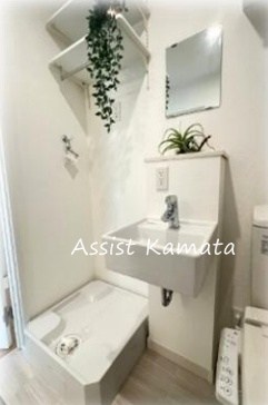 洗面設備　写真は同シリーズ別建物です。