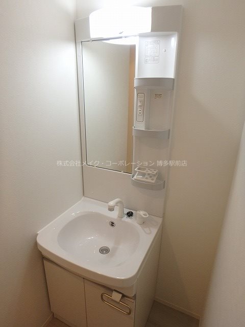 洗面設備　※入居中の為別部屋写真使用現状優先