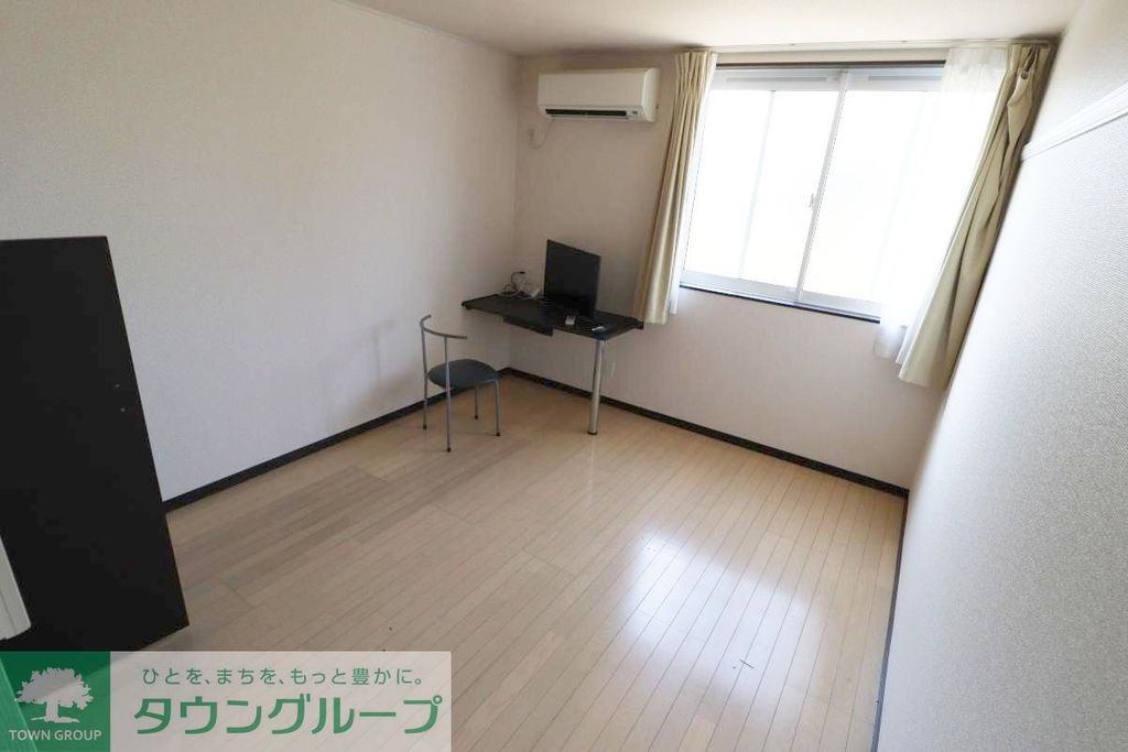 レオネクストセントラルヒルズVIの居間写真